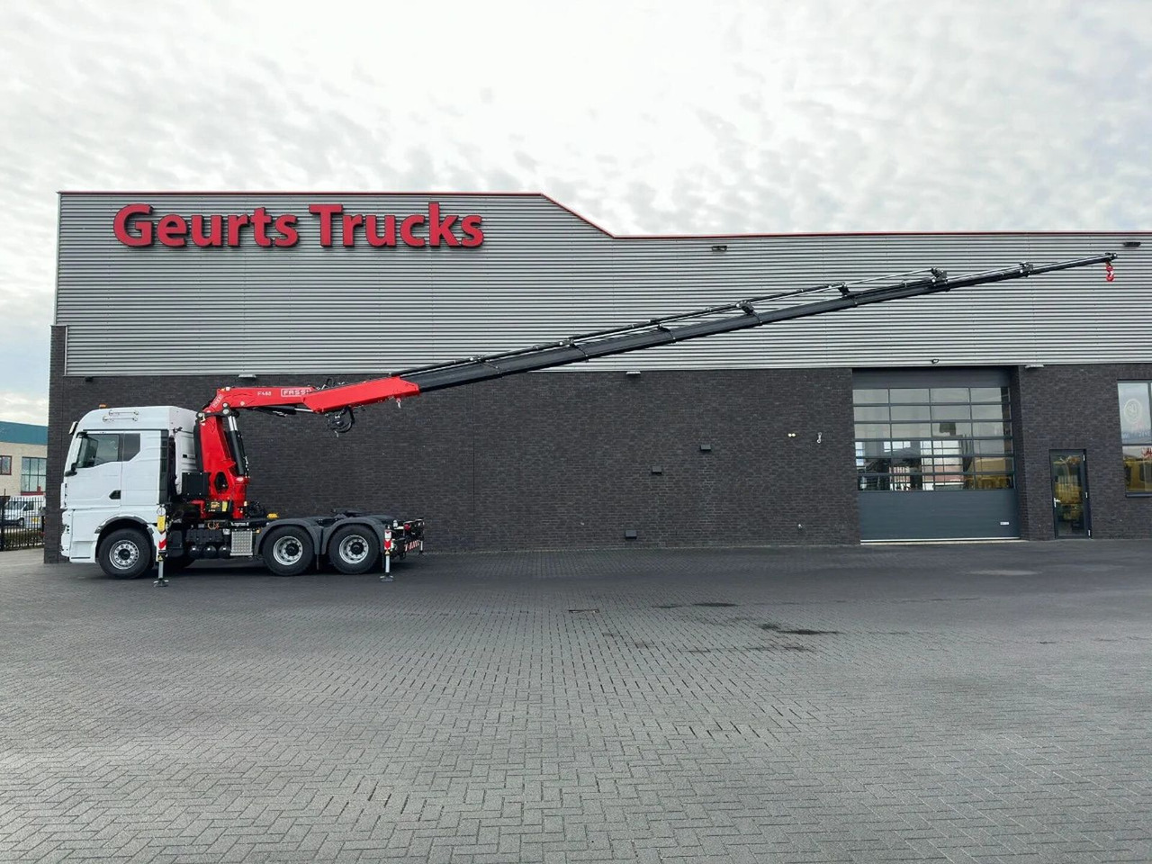 MAN TGX 33.520 6X4 TREKKER-BAKWAGEN COMBI + FASSI F4 - Camión grúa: foto 4 MAN TGX 33.520 6X4 TREKKER-BAKWAGEN COMBI + FASSI F4 - Camión grúa: foto 4