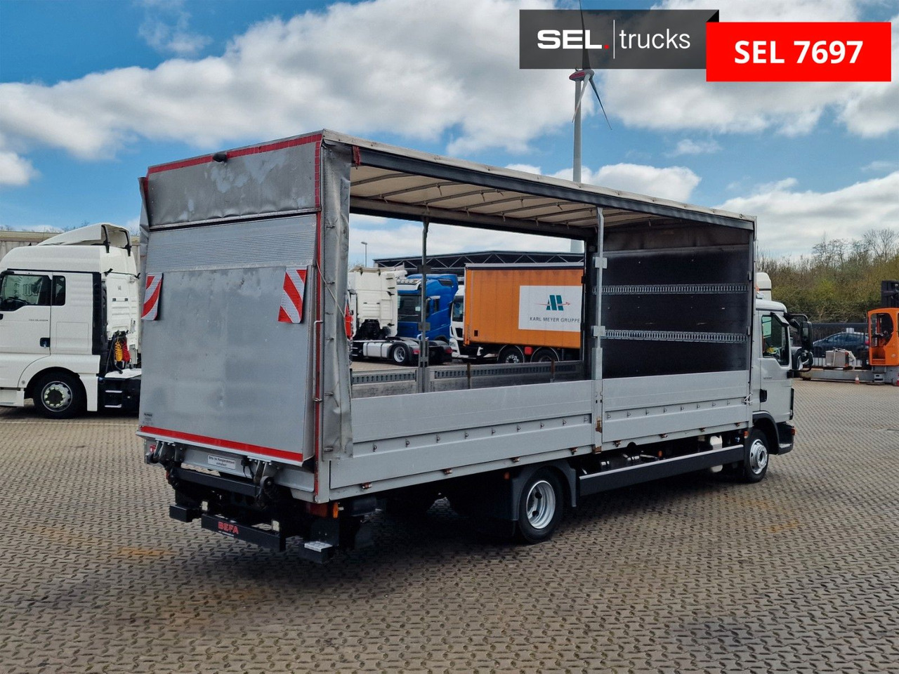 MAN TGL 8.180 4x2 BL / Ladebordwand - Furgoneta con lona: foto 5 MAN TGL 8.180 4x2 BL / Ladebordwand - Furgoneta con lona: foto 5