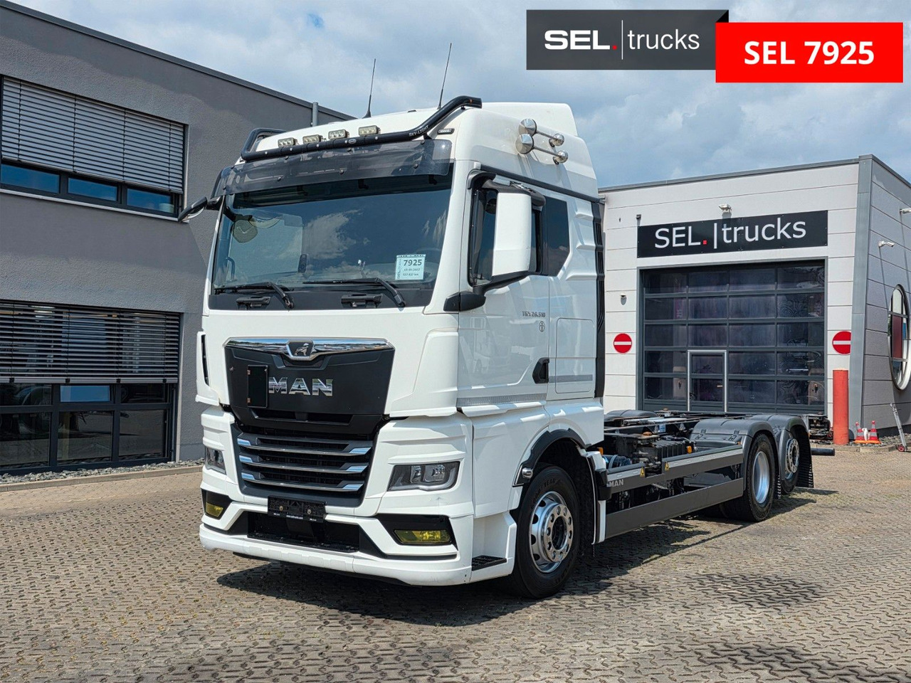 MAN TGX 26.510 6x2-2 LL CH / ZF Intarder / Liftachse - Camión portacontenedore/ Intercambiable: foto 1 MAN TGX 26.510 6x2-2 LL CH / ZF Intarder / Liftachse - Camión portacontenedore/ Intercambiable: foto 1