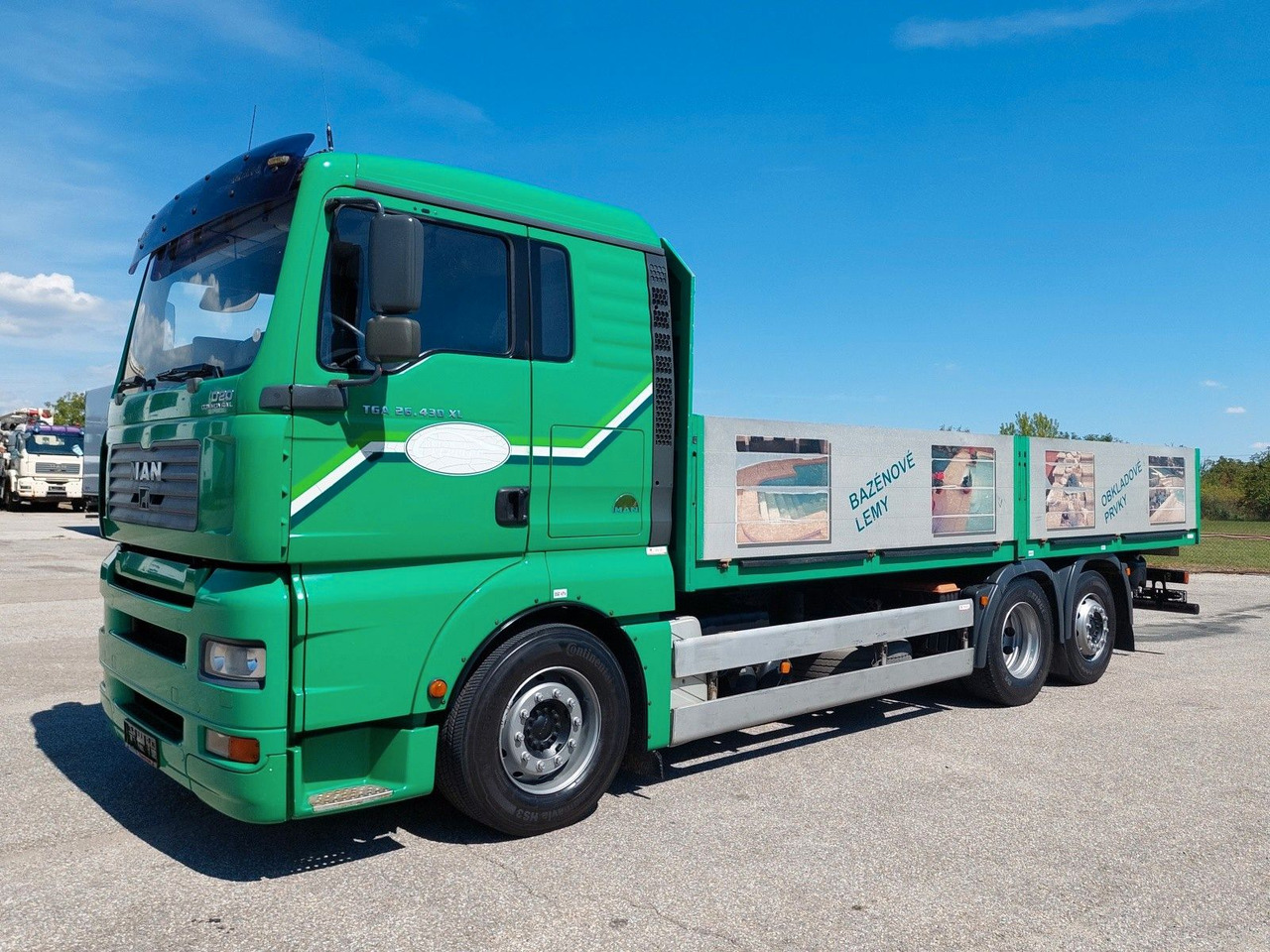 MAN TGA 26.430 LL 6x2-2 - Camión caja abierta: foto 1 MAN TGA 26.430 LL 6x2-2 - Camión caja abierta: foto 1