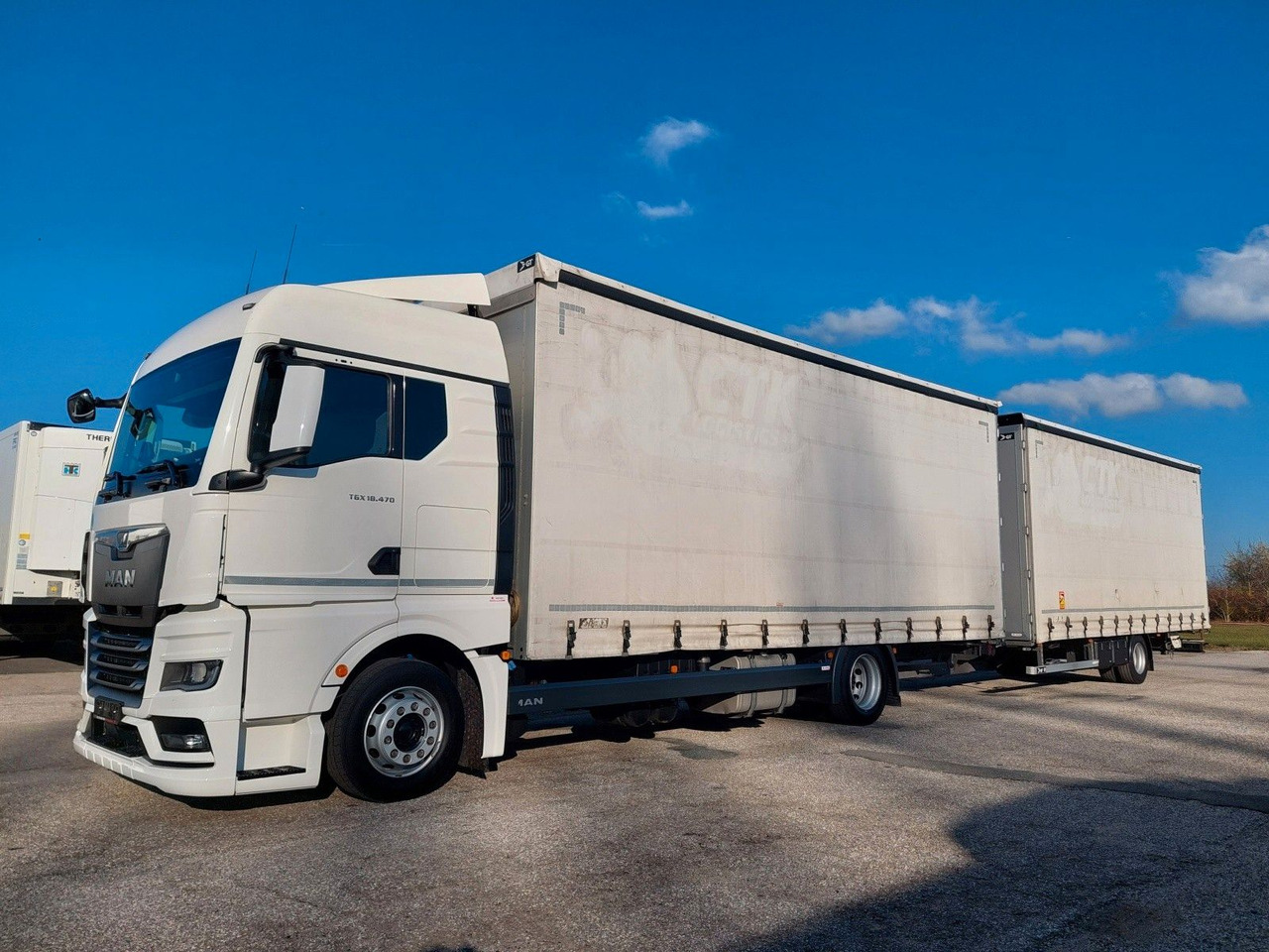 MAN TGX 18.470 LL + Gniotpol G-4080 120 m3 Durchbar - Camión lona: foto 1 MAN TGX 18.470 LL + Gniotpol G-4080 120 m3 Durchbar - Camión lona: foto 1