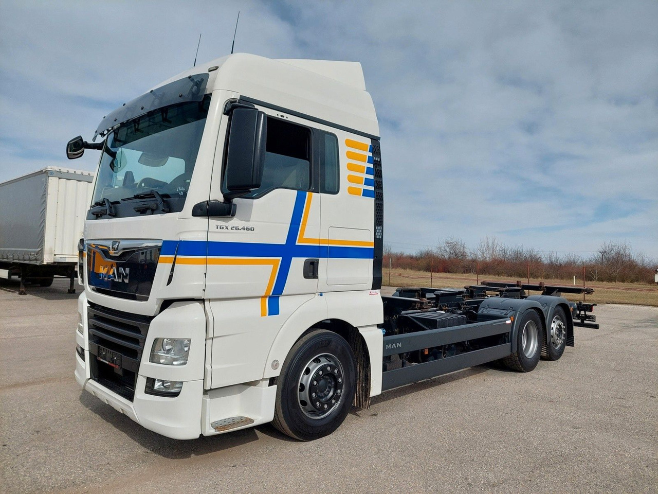 MAN TGX 26.460 LL 6x2/2 - Camión portacontenedore/ Intercambiable: foto 1 MAN TGX 26.460 LL 6x2/2 - Camión portacontenedore/ Intercambiable: foto 1