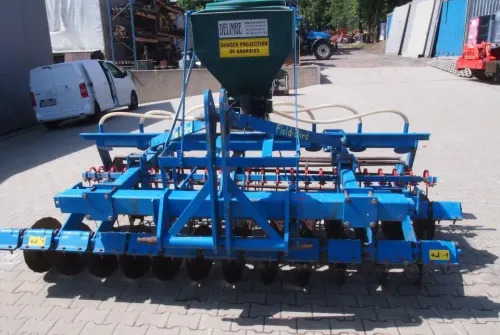 Agregat uprawowo-siewny Rabe Werk 2011 3m brona talerzowa z siewnikiem do poplonów - Combinado de siembra: foto 4 Agregat uprawowo-siewny Rabe Werk 2011 3m brona talerzowa z siewnikiem do poplonów - Combinado de siembra: foto 4