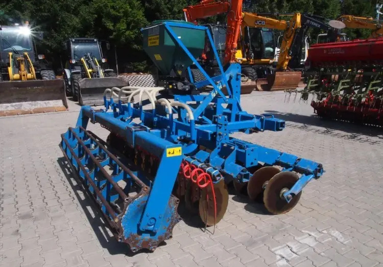 Agregat uprawowo-siewny Rabe Werk 2011 3m brona talerzowa z siewnikiem do poplonów - Combinado de siembra: foto 5 Agregat uprawowo-siewny Rabe Werk 2011 3m brona talerzowa z siewnikiem do poplonów - Combinado de siembra: foto 5