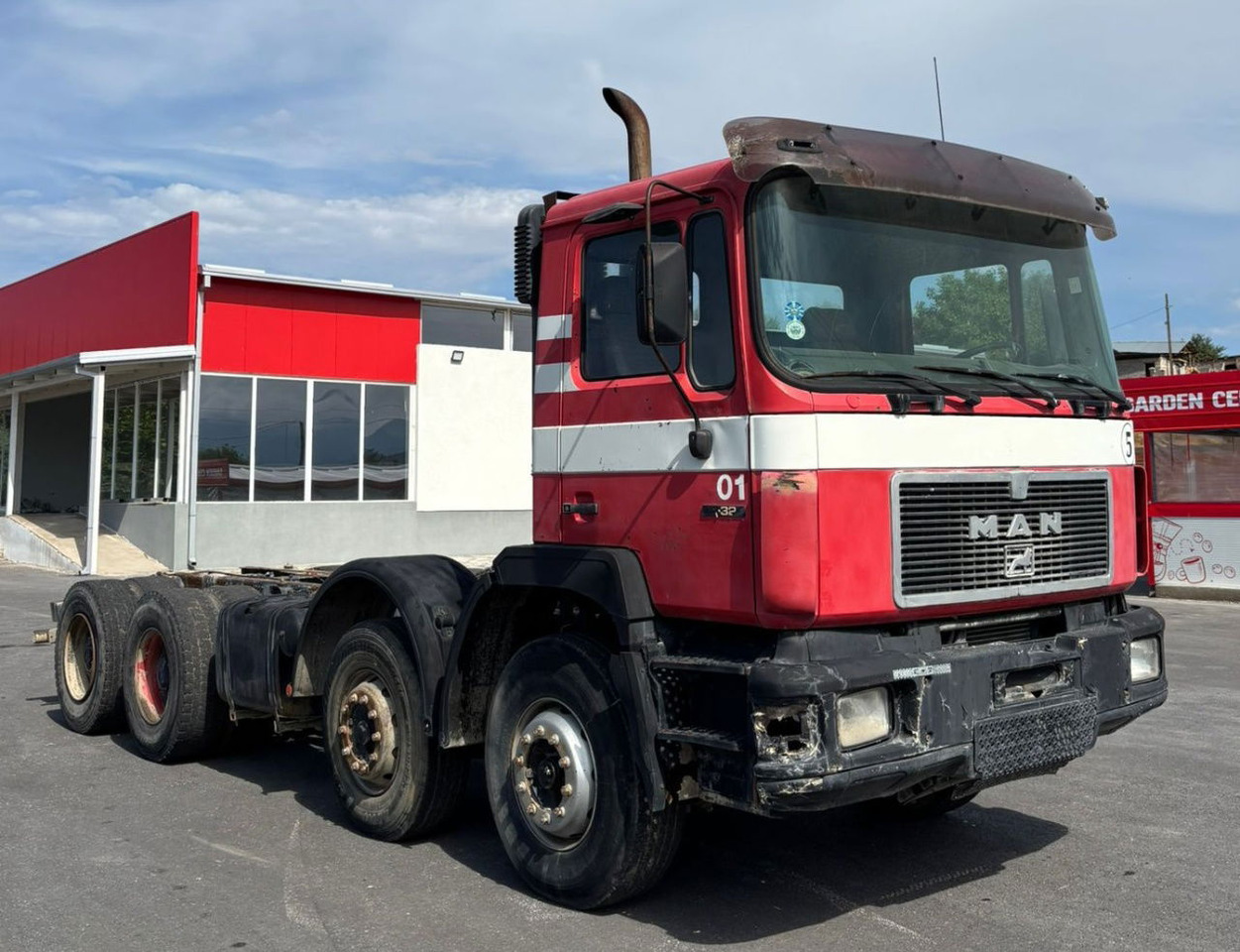 MAN 32.322 8x4 chassis - spring - Camión chasis: foto 2 MAN 32.322 8x4 chassis - spring - Camión chasis: foto 2