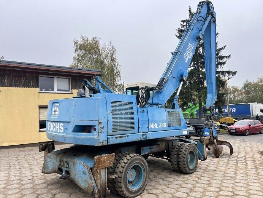 Fuchs MHL340 grab + generator - Manipulador de materiales: foto 5 Fuchs MHL340 grab + generator - Manipulador de materiales: foto 5