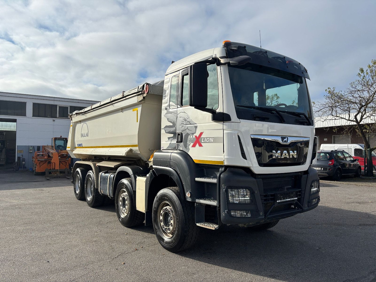 MAN TGS41.510 8x4 Schmitz Muldenkipper Retarder/19m³ - Camión volquete: foto 2 MAN TGS41.510 8x4 Schmitz Muldenkipper Retarder/19m³ - Camión volquete: foto 2