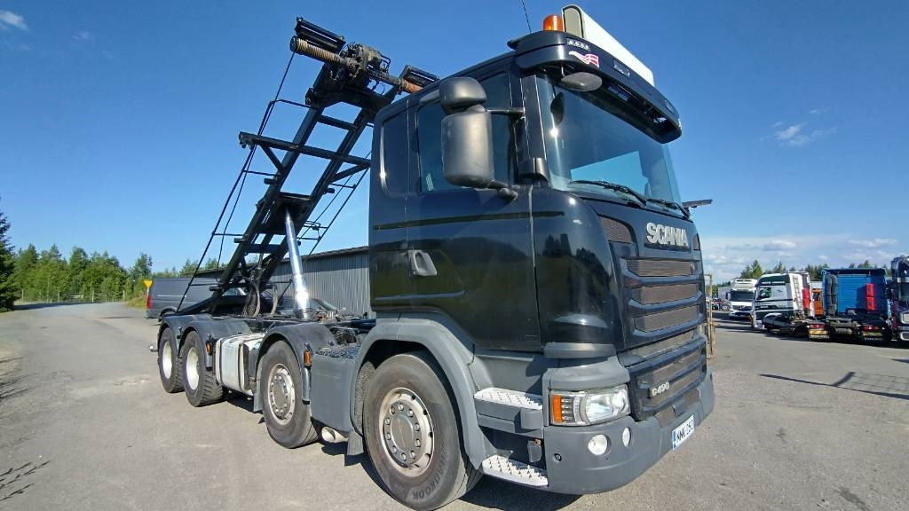 Scania R490 8x4 multilift vaijerilaite,napaperät - Camión portacontenedor de cadenas: foto 1 Scania R490 8x4 multilift vaijerilaite,napaperät - Camión portacontenedor de cadenas: foto 1