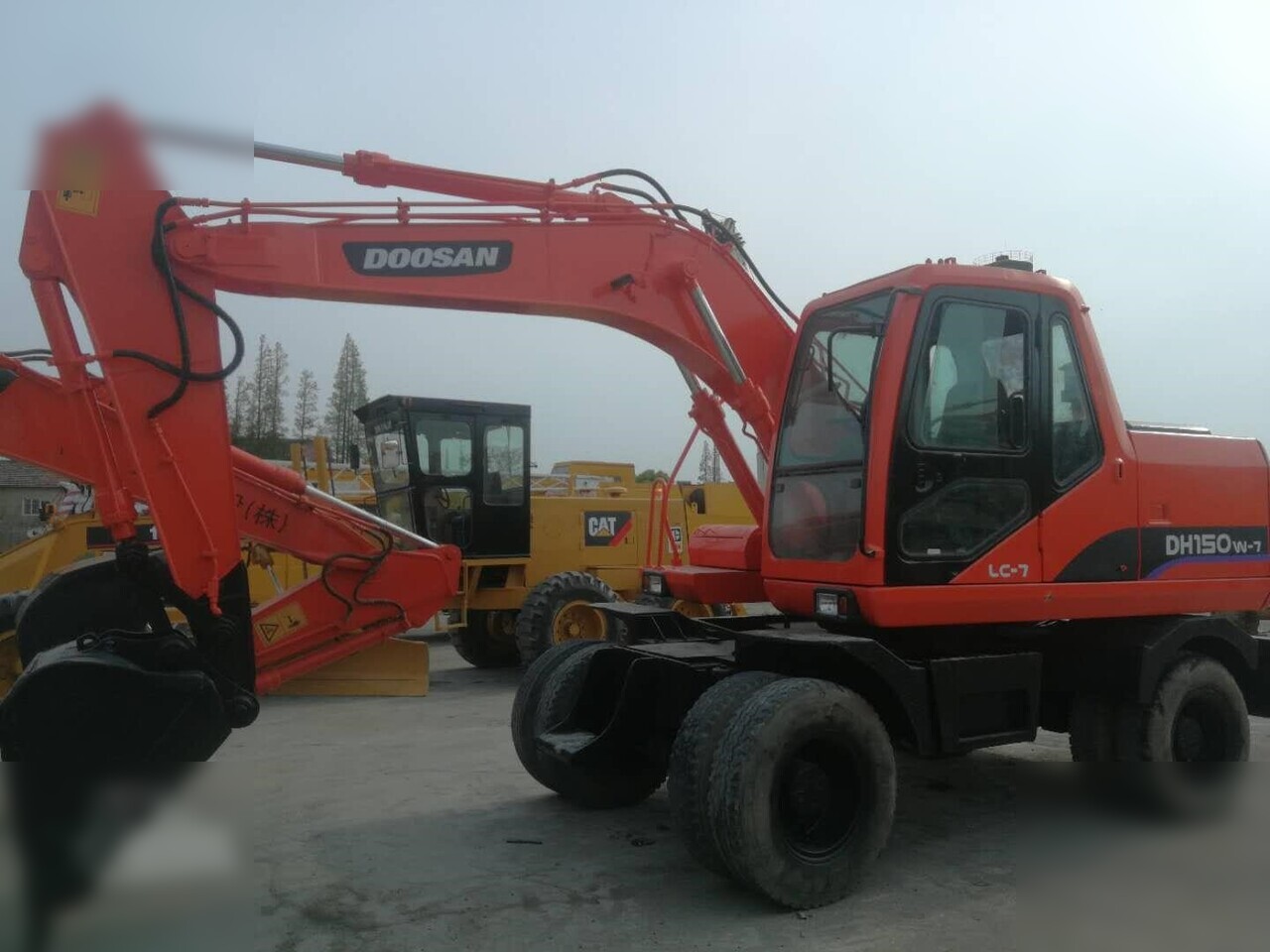 DOOSAN DH150W-7 - Excavadora de ruedas: foto 1 DOOSAN DH150W-7 - Excavadora de ruedas: foto 1