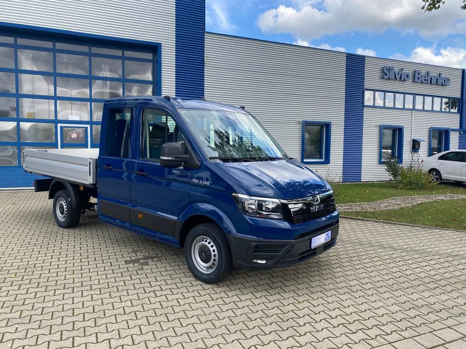 MAN TGE 3.140 Doka Pritsche Next Level *TEMPO*KLIMA*CAM*AHK*APP*PDC*INKL.19% MWST*SOFORT!* - Furgoneta caja abierta, Furgoneta combi: foto 1 MAN TGE 3.140 Doka Pritsche Next Level *TEMPO*KLIMA*CAM*AHK*APP*PDC*INKL.19% MWST*SOFORT!* - Furgoneta caja abierta, Furgoneta combi: foto 1