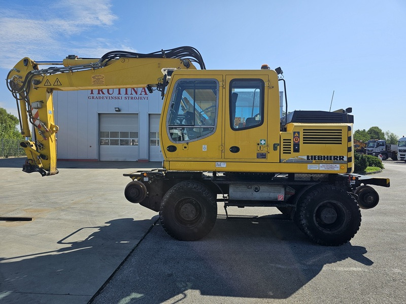 LIEBHERR A900C ZW - Excavadora de ruedas: foto 1 LIEBHERR A900C ZW - Excavadora de ruedas: foto 1
