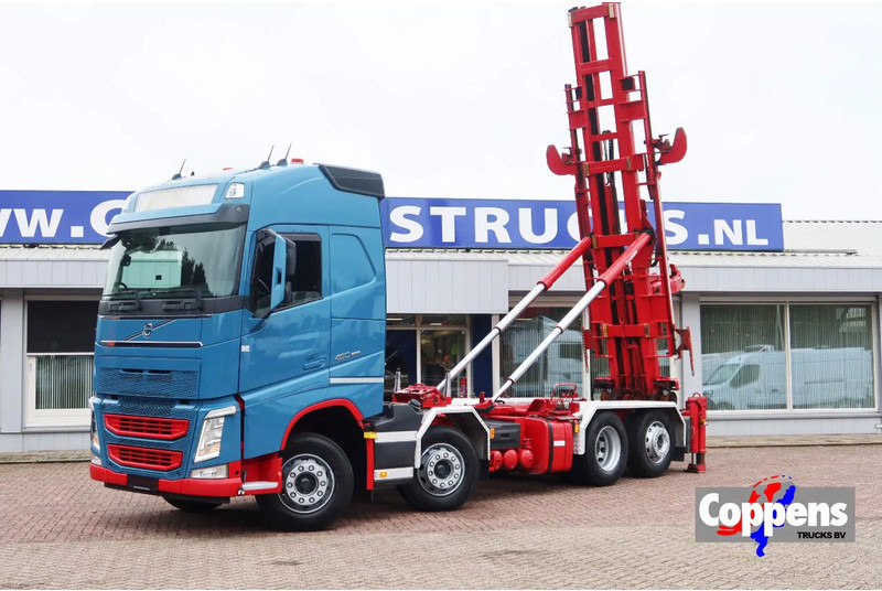 Volvo FH 460 Hooklift 8x2 Haakarm. 3x Steering axle - Camión con equipo de cable: foto 1 Volvo FH 460 Hooklift 8x2 Haakarm. 3x Steering axle - Camión con equipo de cable: foto 1