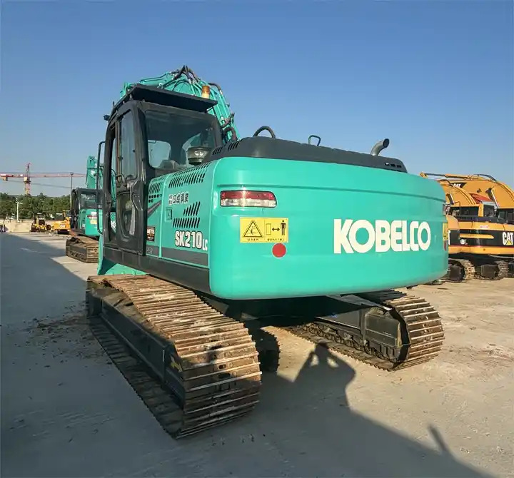 Japan Surplus Construction Excavator Kobelco Sk210 Sk230 Crawler Excavator With Hammer Pipe In Shanghai - Excavadora de cadenas: foto 2 Japan Surplus Construction Excavator Kobelco Sk210 Sk230 Crawler Excavator With Hammer Pipe In Shanghai - Excavadora de cadenas: foto 2
