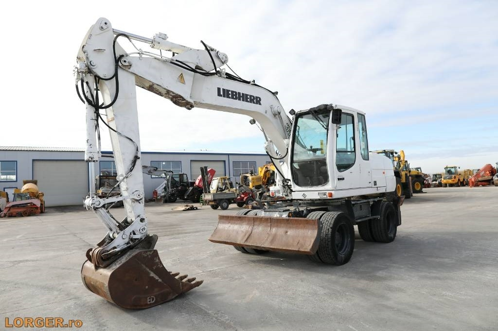 Liebherr A 316 Litronic - Excavadora de ruedas: foto 1 Liebherr A 316 Litronic - Excavadora de ruedas: foto 1