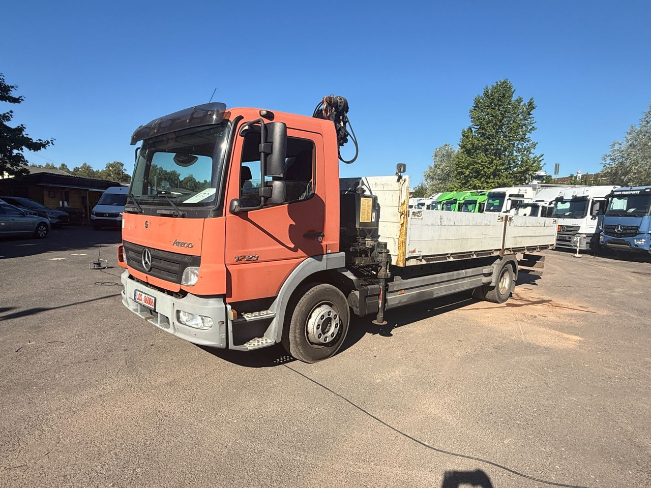 Mercedes-Benz Atego 1223 mit Kran MKG HLK 76 - Camión caja abierta, Camión grúa: foto 3 Mercedes-Benz Atego 1223 mit Kran MKG HLK 76 - Camión caja abierta, Camión grúa: foto 3