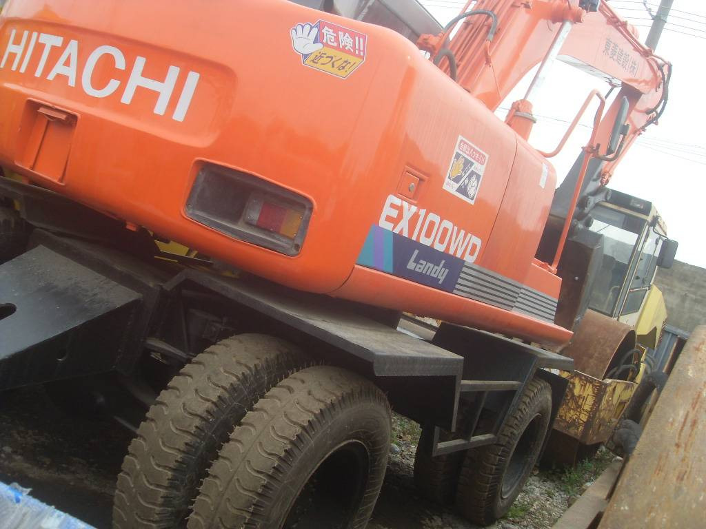 Hitachi EX100WD-3 - Excavadora de ruedas: foto 1 Hitachi EX100WD-3 - Excavadora de ruedas: foto 1