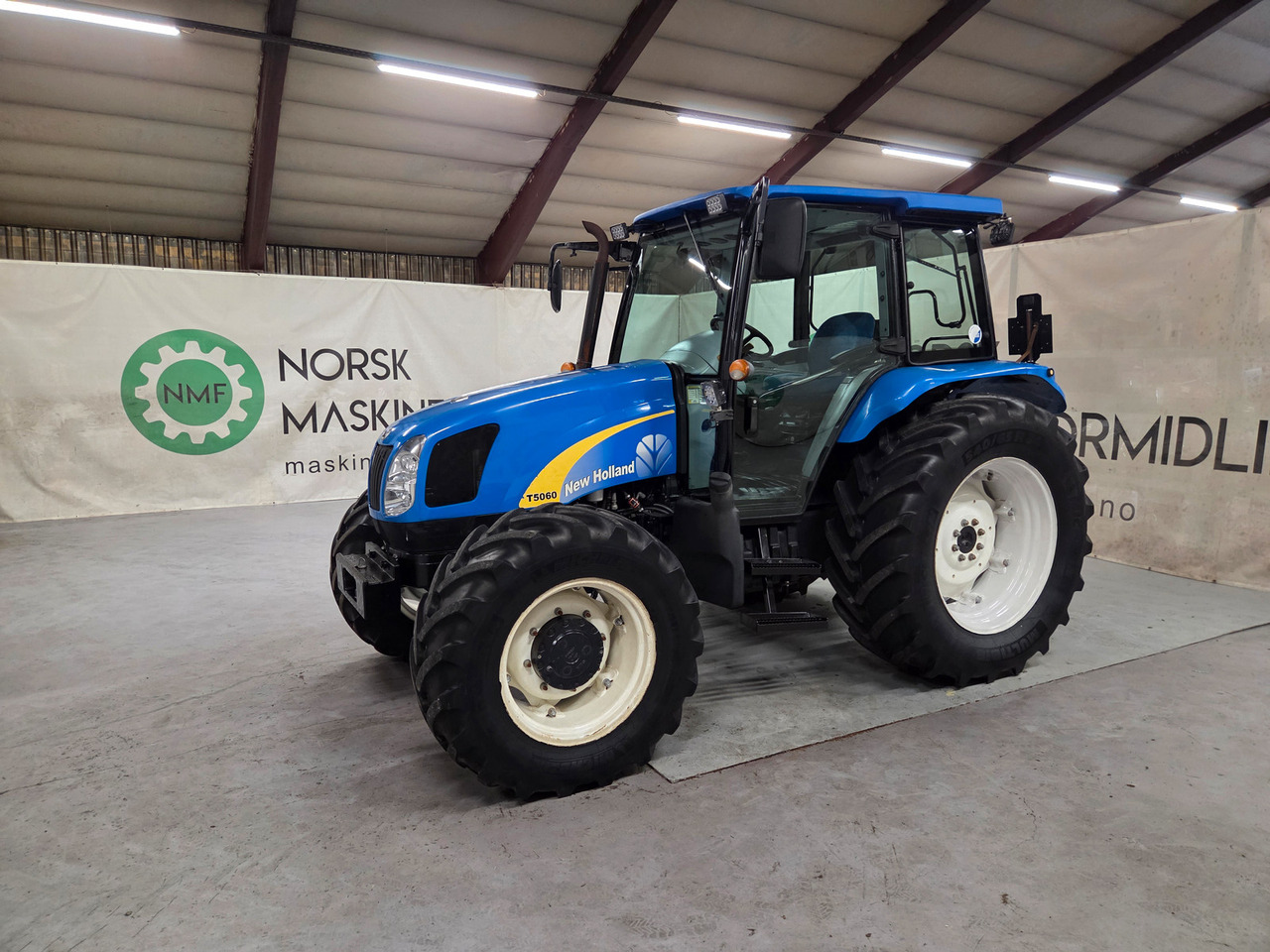 New Holland T5060 #Fin 1 eiers traktor - Tractor: foto 1 New Holland T5060 #Fin 1 eiers traktor - Tractor: foto 1