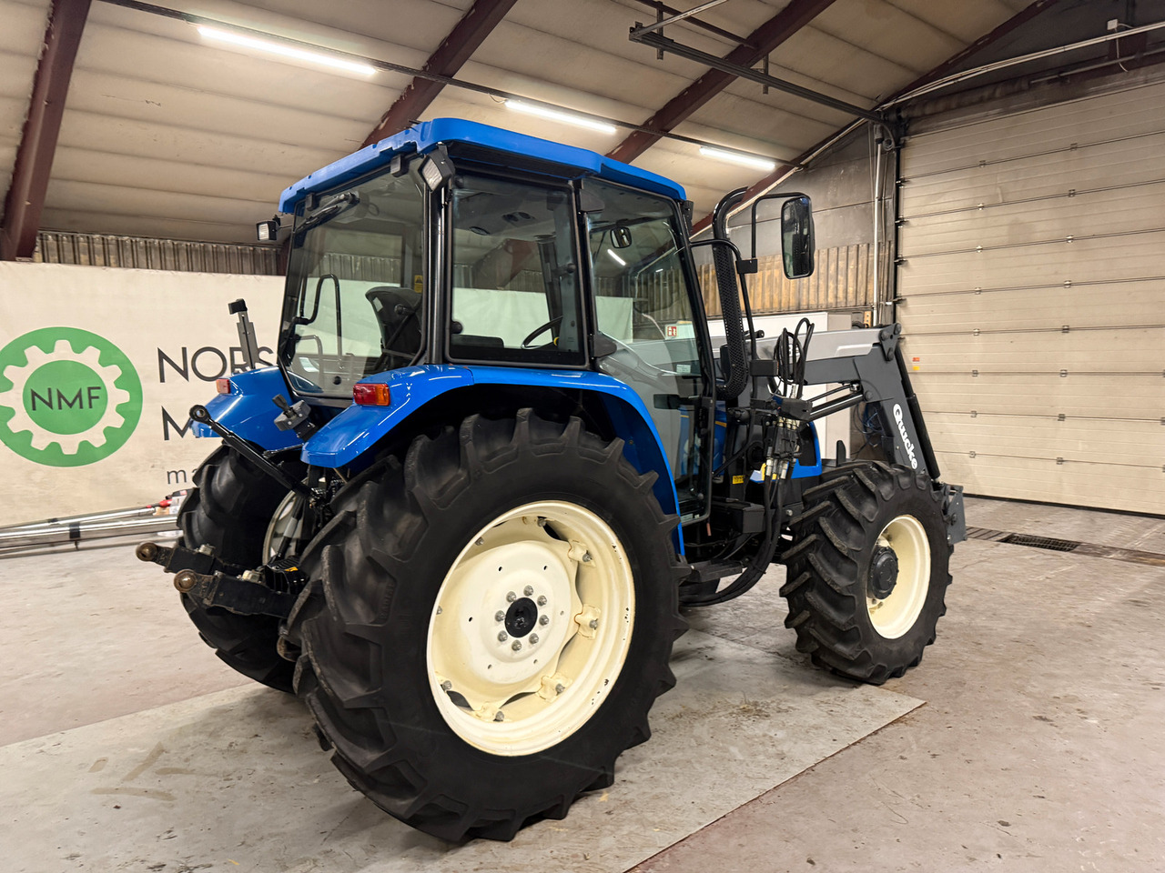 New Holland TL90 - Tractor: foto 5 New Holland TL90 - Tractor: foto 5