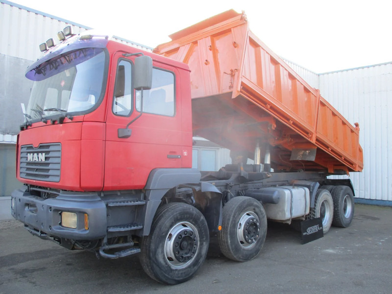 MAN 35.414 , 8x4 , ZF Manual , EURO 3 , 3 way tipper , Spring suspension - Camión volquete: foto 1 MAN 35.414 , 8x4 , ZF Manual , EURO 3 , 3 way tipper , Spring suspension - Camión volquete: foto 1