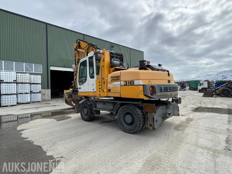 2009 Liebherr A316 Litronic hjulgraver - Hevbar hytte - Klype - 13065T - Excavadora: foto 3 2009 Liebherr A316 Litronic hjulgraver - Hevbar hytte - Klype - 13065T - Excavadora: foto 3