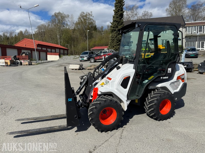 2022 Bobcat L23 kompaktlaster med skuffe, gafler og hydraulisksnøskjær - Minicargadora: foto 1 2022 Bobcat L23 kompaktlaster med skuffe, gafler og hydraulisksnøskjær - Minicargadora: foto 1