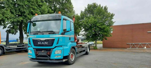 MAN TGS 18.440 Abroller mit Funk +Kran vor. - Camión multibasculante, Camión grúa: foto 1 MAN TGS 18.440 Abroller mit Funk +Kran vor. - Camión multibasculante, Camión grúa: foto 1