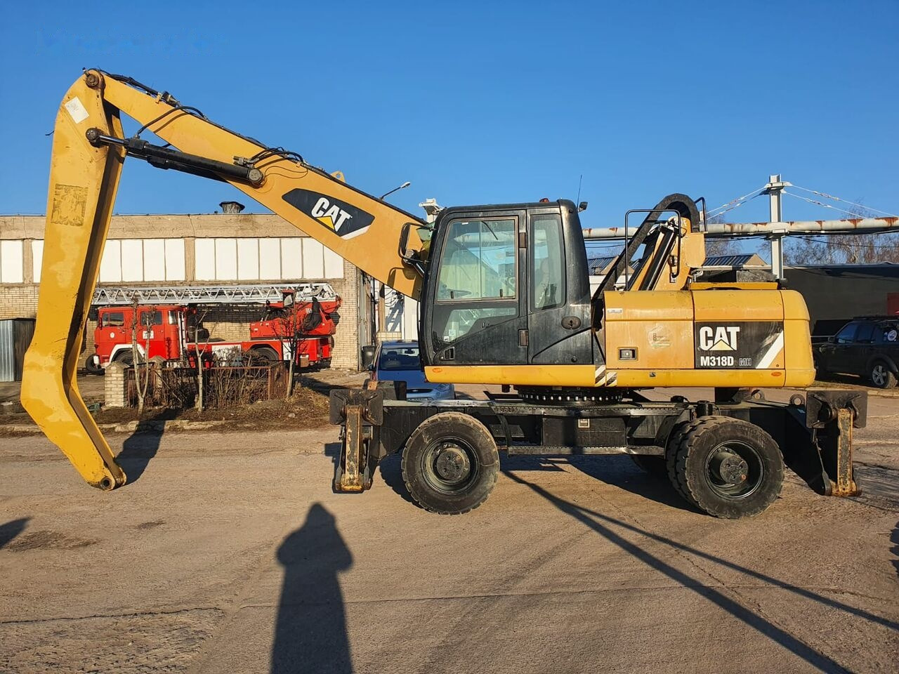 Caterpillar 318 D MH - Manipulador de materiales: foto 1 Caterpillar 318 D MH - Manipulador de materiales: foto 1