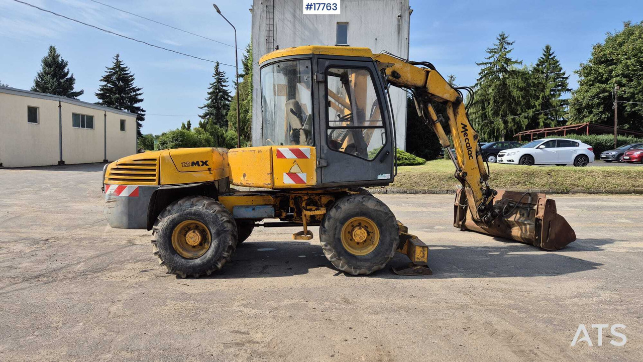MECALAC 12MX wheeled excavator (1996) - Excavadora de ruedas: foto 4 MECALAC 12MX wheeled excavator (1996) - Excavadora de ruedas: foto 4