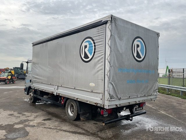 2007 MAN TGL12.210 4x2 Curtain Side Truck - Camión lona: foto 1 2007 MAN TGL12.210 4x2 Curtain Side Truck - Camión lona: foto 1