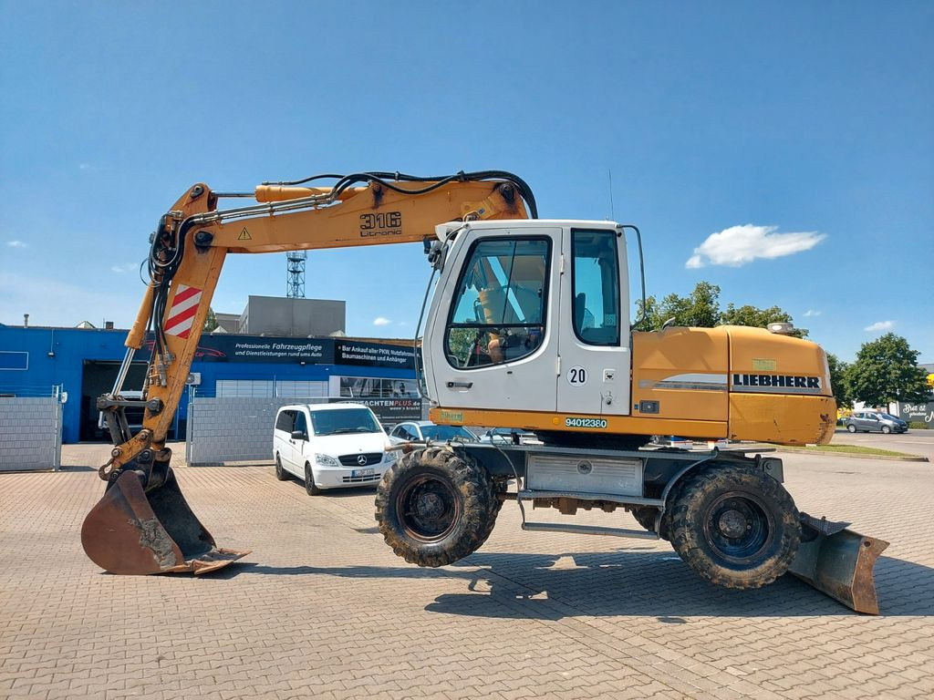 Liebherr A 316 LITRONIC TL + 2005 DEUTZ 13400 STD. - Excavadora de ruedas: foto 2 Liebherr A 316 LITRONIC TL + 2005 DEUTZ 13400 STD. - Excavadora de ruedas: foto 2