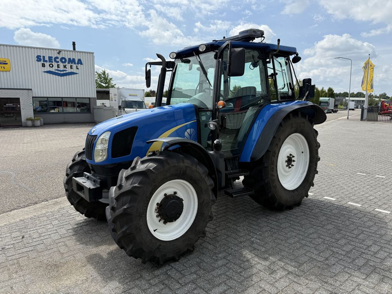 New Holland T5040 CAB + GPS - Tractor: foto 1 New Holland T5040 CAB + GPS - Tractor: foto 1