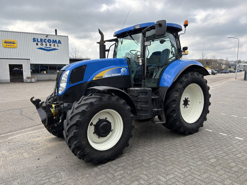 New Holland T6080 Power Command - Tractor: foto 1 New Holland T6080 Power Command - Tractor: foto 1