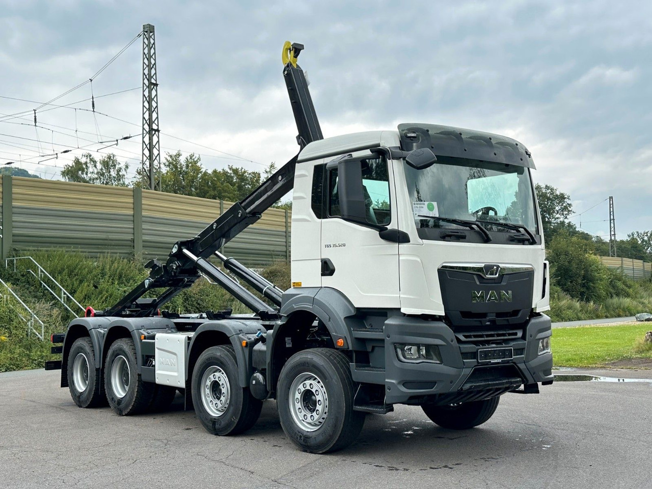 MAN TGS 35.520 8x4 Euro6e MultiLift 25s59 - Camión multibasculante: foto 1 MAN TGS 35.520 8x4 Euro6e MultiLift 25s59 - Camión multibasculante: foto 1