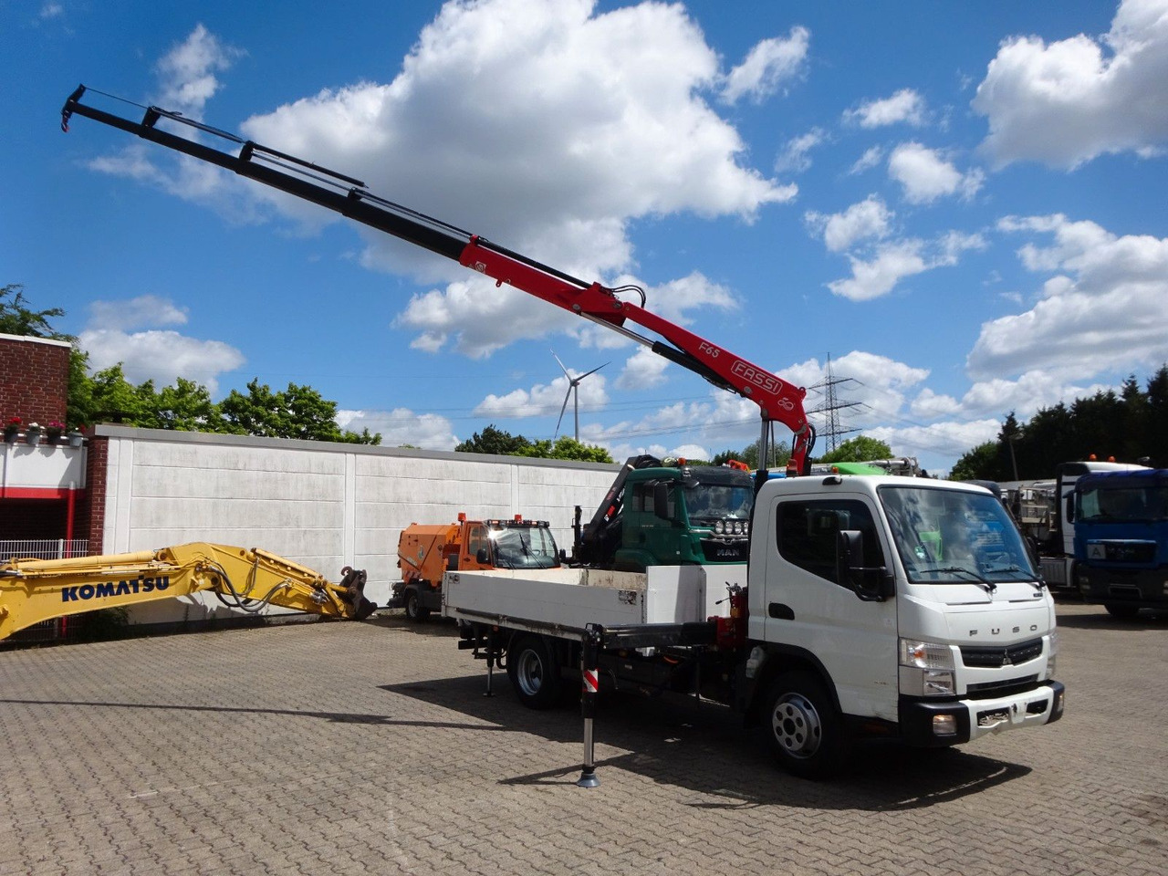 FUSO Canter 7C15 mit FASSI F65A Kran - Furgoneta caja abierta: foto 5 FUSO Canter 7C15 mit FASSI F65A Kran - Furgoneta caja abierta: foto 5
