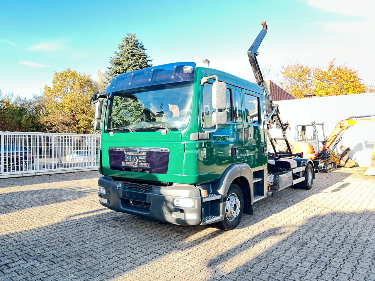 MAN 12.250 Doppelkabine Abroller - Camión multibasculante: foto 2 MAN 12.250 Doppelkabine Abroller - Camión multibasculante: foto 2