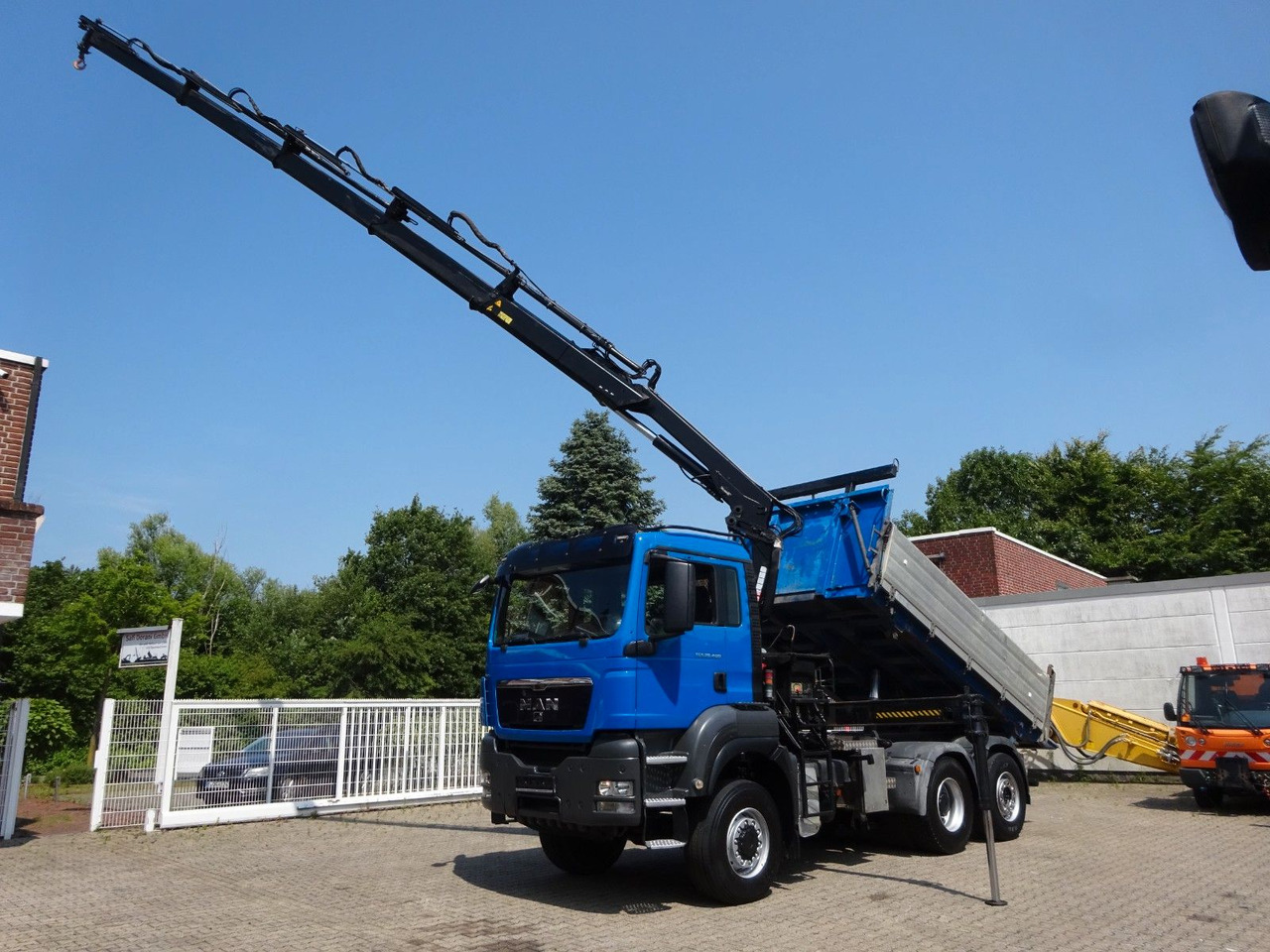 MAN 28.400 TGS 3Skipper+HIAB 166 E-4 HIPRPO 6x4-4 - Camión volquete, Camión grúa: foto 1 MAN 28.400 TGS 3Skipper+HIAB 166 E-4 HIPRPO 6x4-4 - Camión volquete, Camión grúa: foto 1