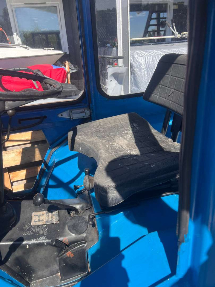 Iseki TX1500 brøyteskjær og feiekost - Tractor: foto 3 Iseki TX1500 brøyteskjær og feiekost - Tractor: foto 3