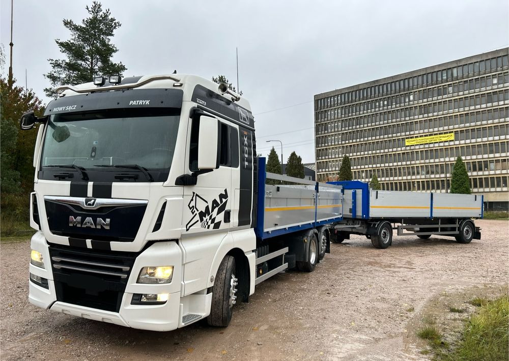 MAN TGX Tandem 1m burty TOP KOMPLET / ALUFELGI / zarejestrowany gotowy do pracy / przyczepa 18t / FULL OPCJA / 26.420 26.460 26.500 26.400 26.440 26.480 26.510 460 500 - Camión caja abierta: foto 1 MAN TGX Tandem 1m burty TOP KOMPLET / ALUFELGI / zarejestrowany gotowy do pracy / przyczepa 18t / FULL OPCJA / 26.420 26.460 26.500 26.400 26.440 26.480 26.510 460 500 - Camión caja abierta: foto 1