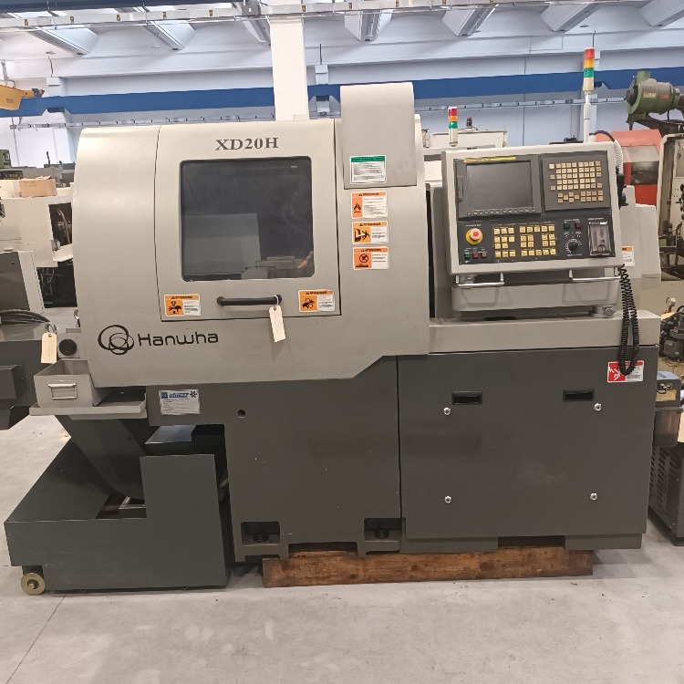 Tornio a fantina mobile a 5 assi Cnc Hanwha XD-20H - Torno de metal: foto 1 Tornio a fantina mobile a 5 assi Cnc Hanwha XD-20H - Torno de metal: foto 1