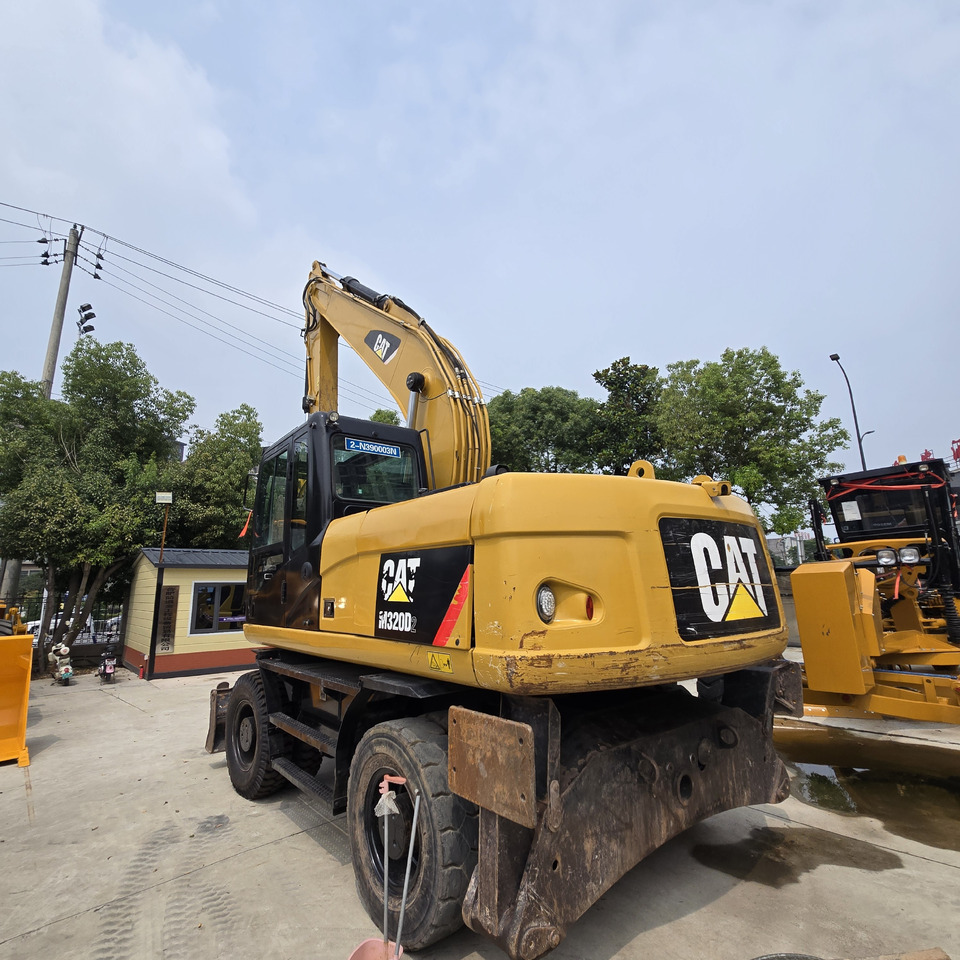 Excavadora de ruedas CAT M320D2: foto 6