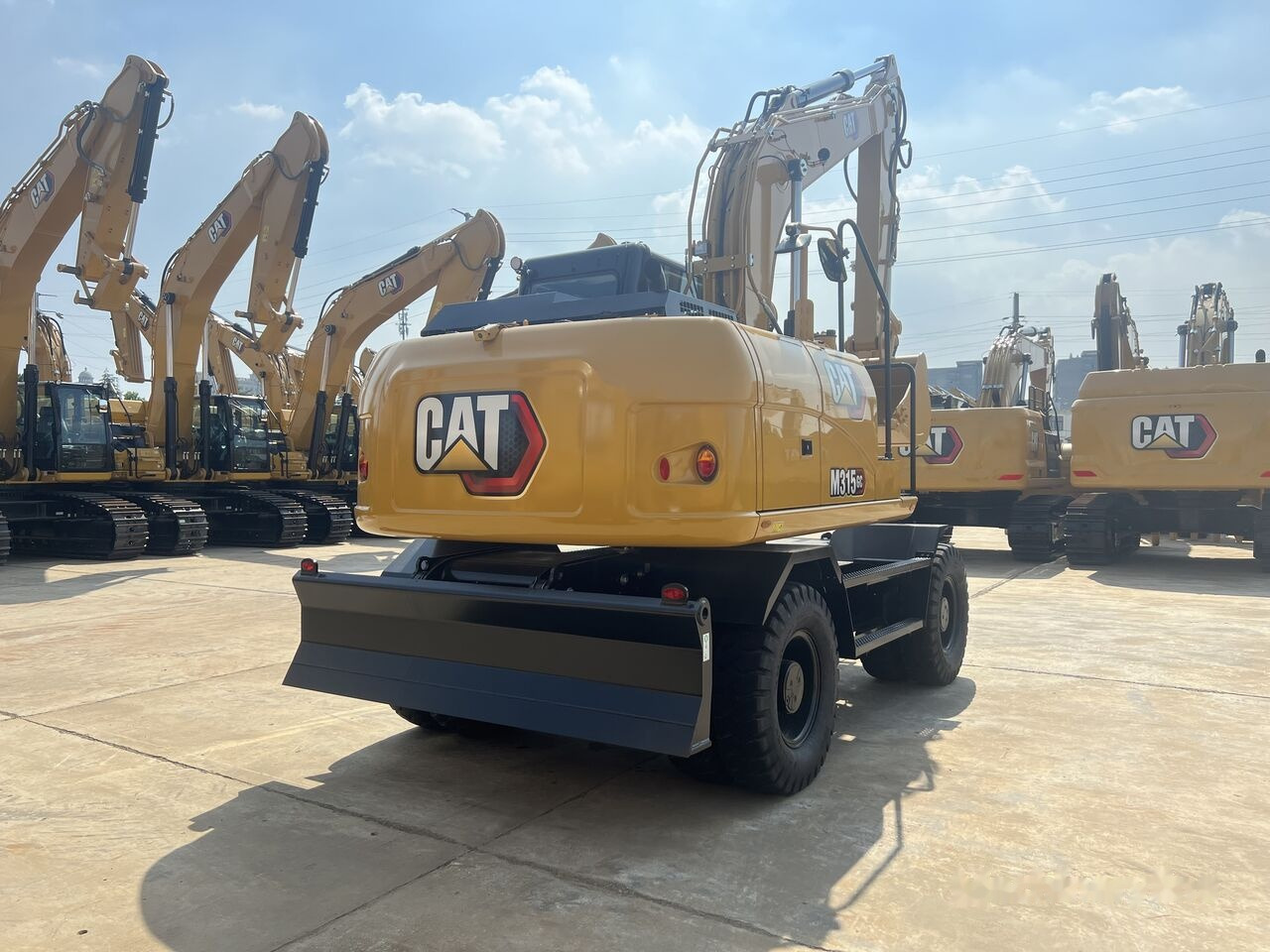 Caterpillar M315GC NEW MACHINE - Excavadora de ruedas: foto 1 Caterpillar M315GC NEW MACHINE - Excavadora de ruedas: foto 1