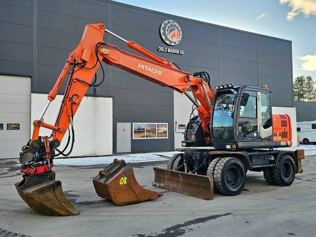 Hitachi ZX 145 W-3 - Excavadora de ruedas: foto 1 Hitachi ZX 145 W-3 - Excavadora de ruedas: foto 1