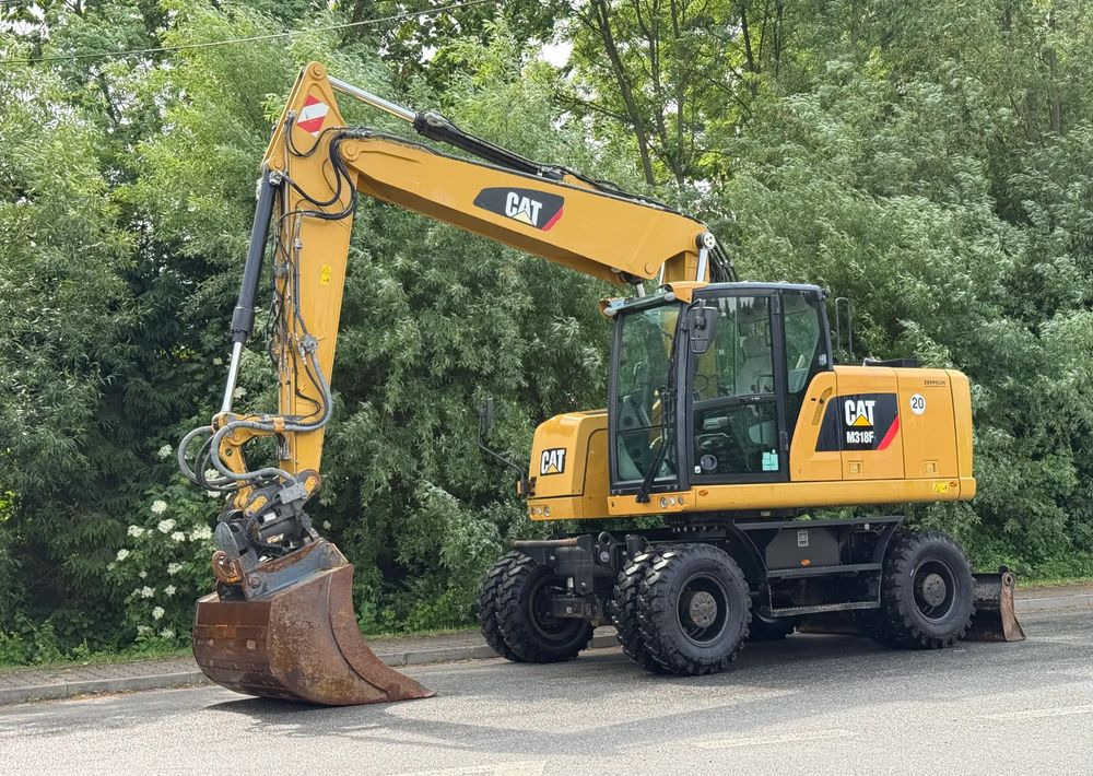 Caterpillar CAT 318 F * Powertilt * Sprowadzony* 9700 MTG * Caterpillar * Stan Perfekcyjny - Excavadora de ruedas: foto 1 Caterpillar CAT 318 F * Powertilt * Sprowadzony* 9700 MTG * Caterpillar * Stan Perfekcyjny - Excavadora de ruedas: foto 1