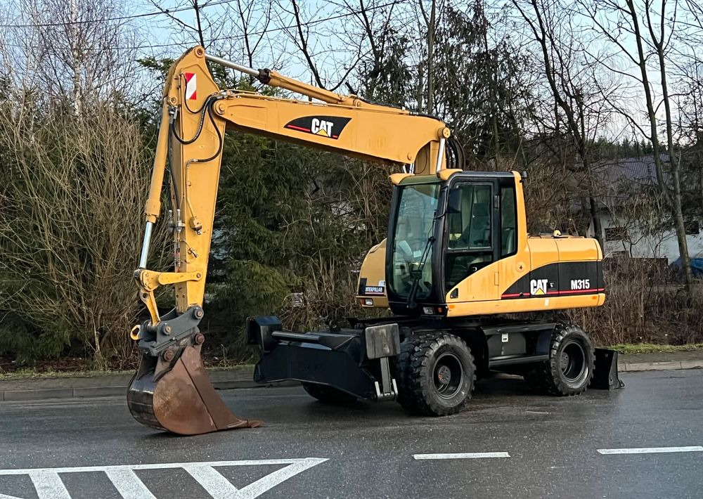 Caterpillar CAT M315C CATERPILLAR SPROWADZONY Bardzo Dobry Stan - Excavadora de ruedas: foto 1 Caterpillar CAT M315C CATERPILLAR SPROWADZONY Bardzo Dobry Stan - Excavadora de ruedas: foto 1