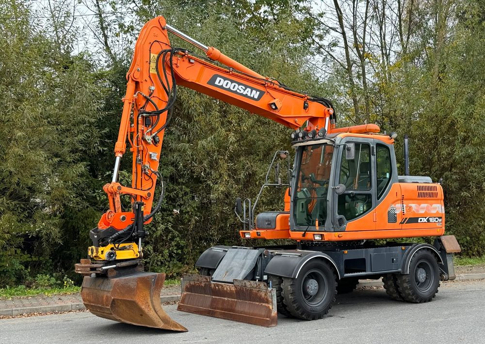Doosan * DOOSAN DX160W *ROTOTILT* GPS 2D Leica * Sprowadzona * Stan Perfekcyjny * Koparka Kołowa * - Excavadora de ruedas: foto 1 Doosan * DOOSAN DX160W *ROTOTILT* GPS 2D Leica * Sprowadzona * Stan Perfekcyjny * Koparka Kołowa * - Excavadora de ruedas: foto 1