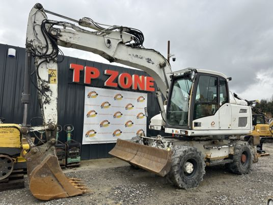 Volvo EW140D à 34900 € HT - Excavadora de ruedas: foto 1 Volvo EW140D à 34900 € HT - Excavadora de ruedas: foto 1