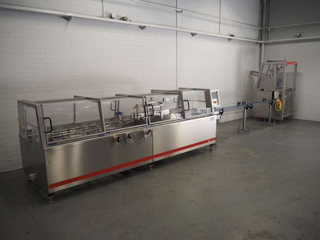 Schut Systems carton line EM60 - Maquinaria de embalaje: foto 1 Schut Systems carton line EM60 - Maquinaria de embalaje: foto 1