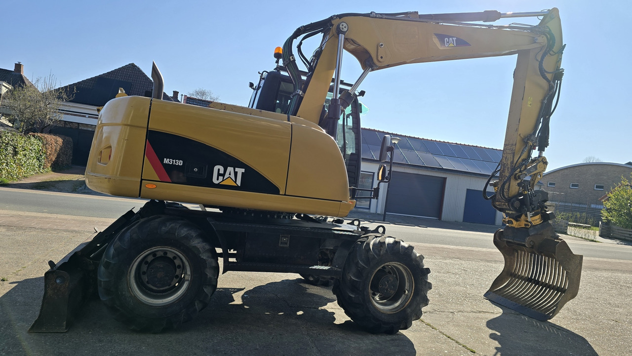 CATERPILLAR M313D - Excavadora de ruedas: foto 4 CATERPILLAR M313D - Excavadora de ruedas: foto 4
