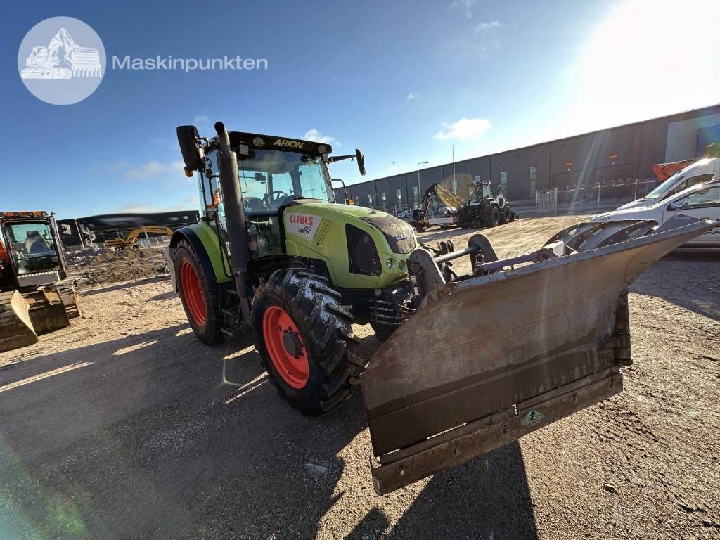 Claas Arion 410 - Tractor: foto 1 Claas Arion 410 - Tractor: foto 1