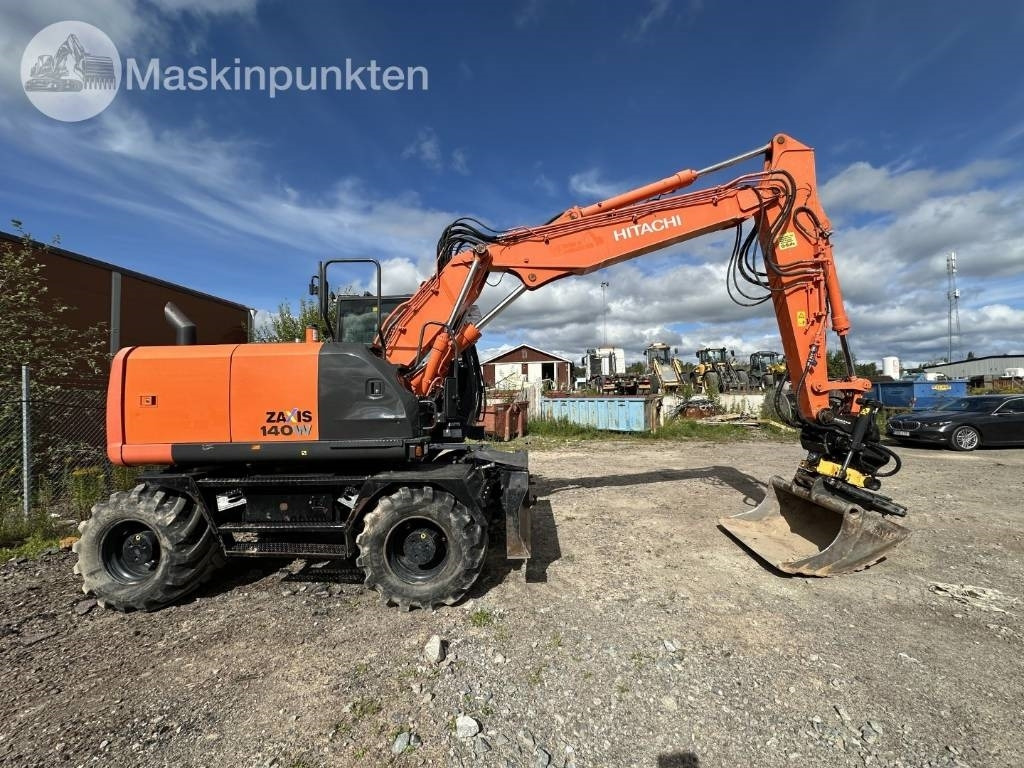 Hitachi ZX 140 W-5B - Excavadora de ruedas: foto 4 Hitachi ZX 140 W-5B - Excavadora de ruedas: foto 4